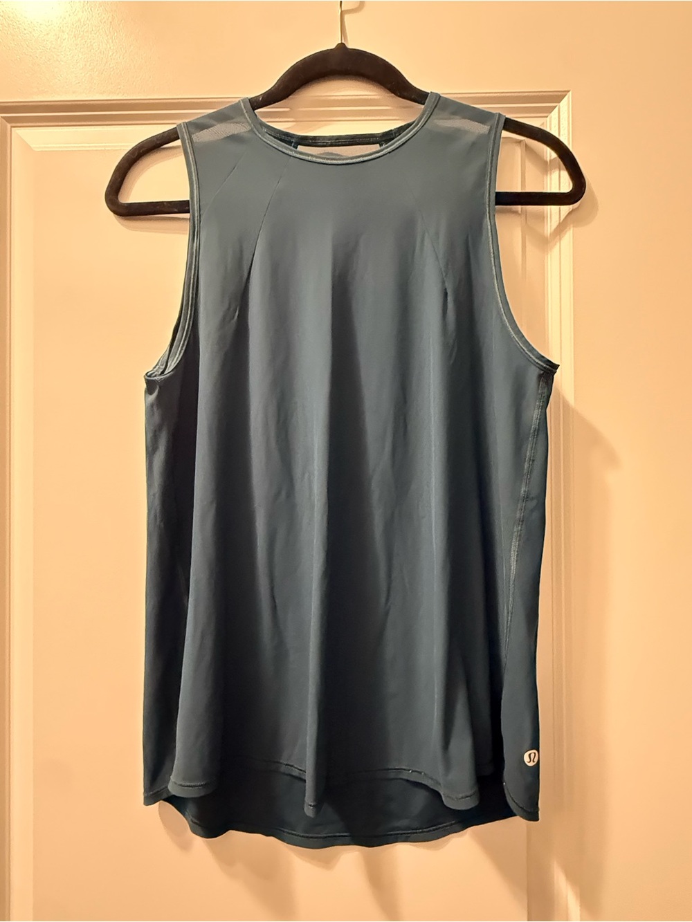 Lululemon sculpt mesh back tank in a dark teal color